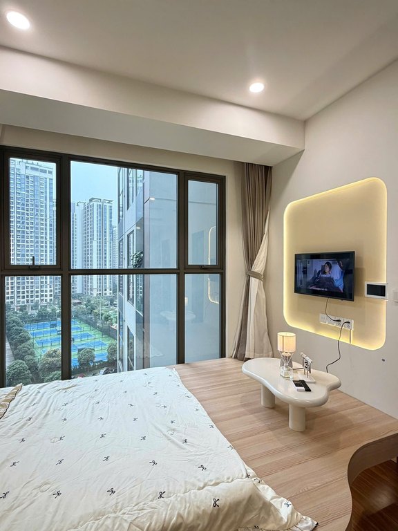 Bedroom & Balcony View — Studio Apartment